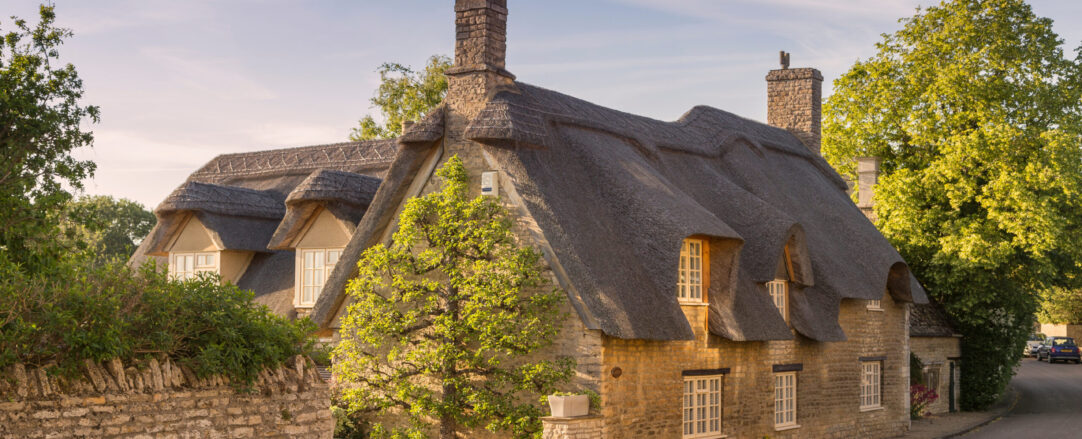 Beautiful thatched cottage in a rural village, in Northamptonshire, England.