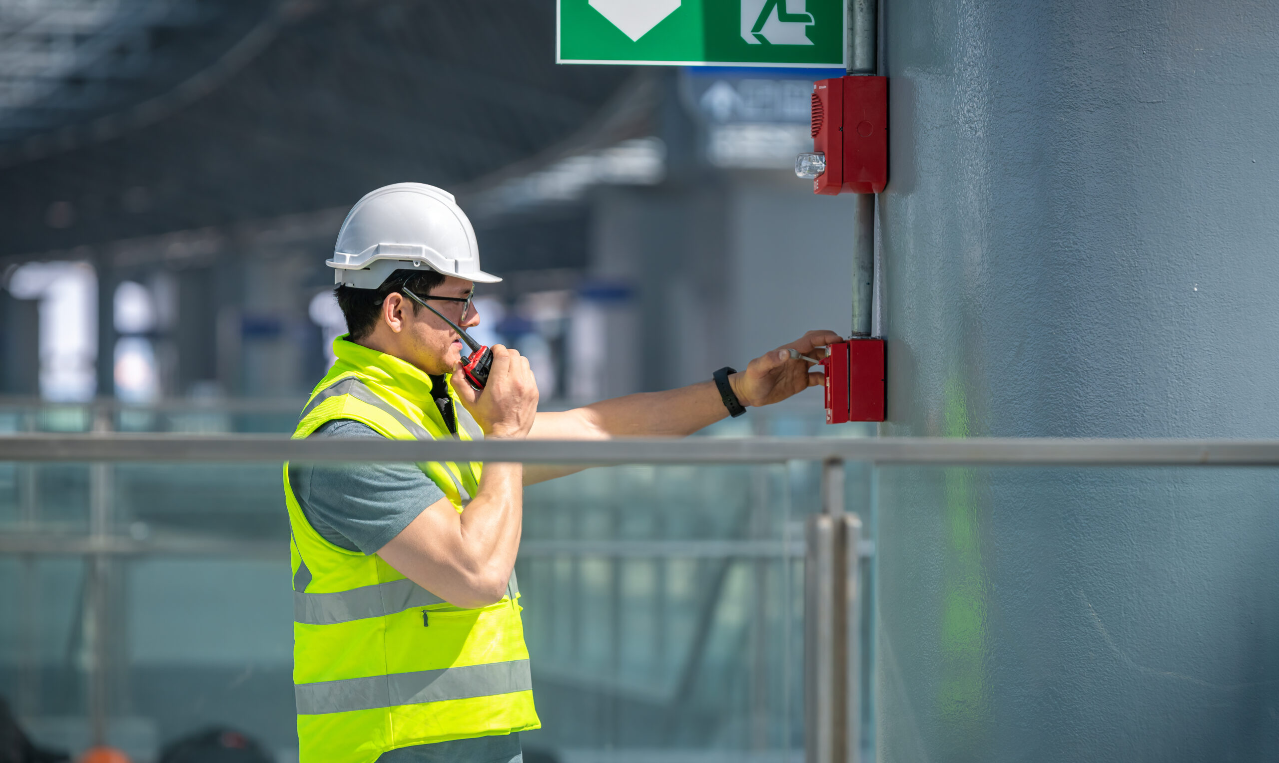 Engineer wearing safety unifrom and helmet under checking fire a